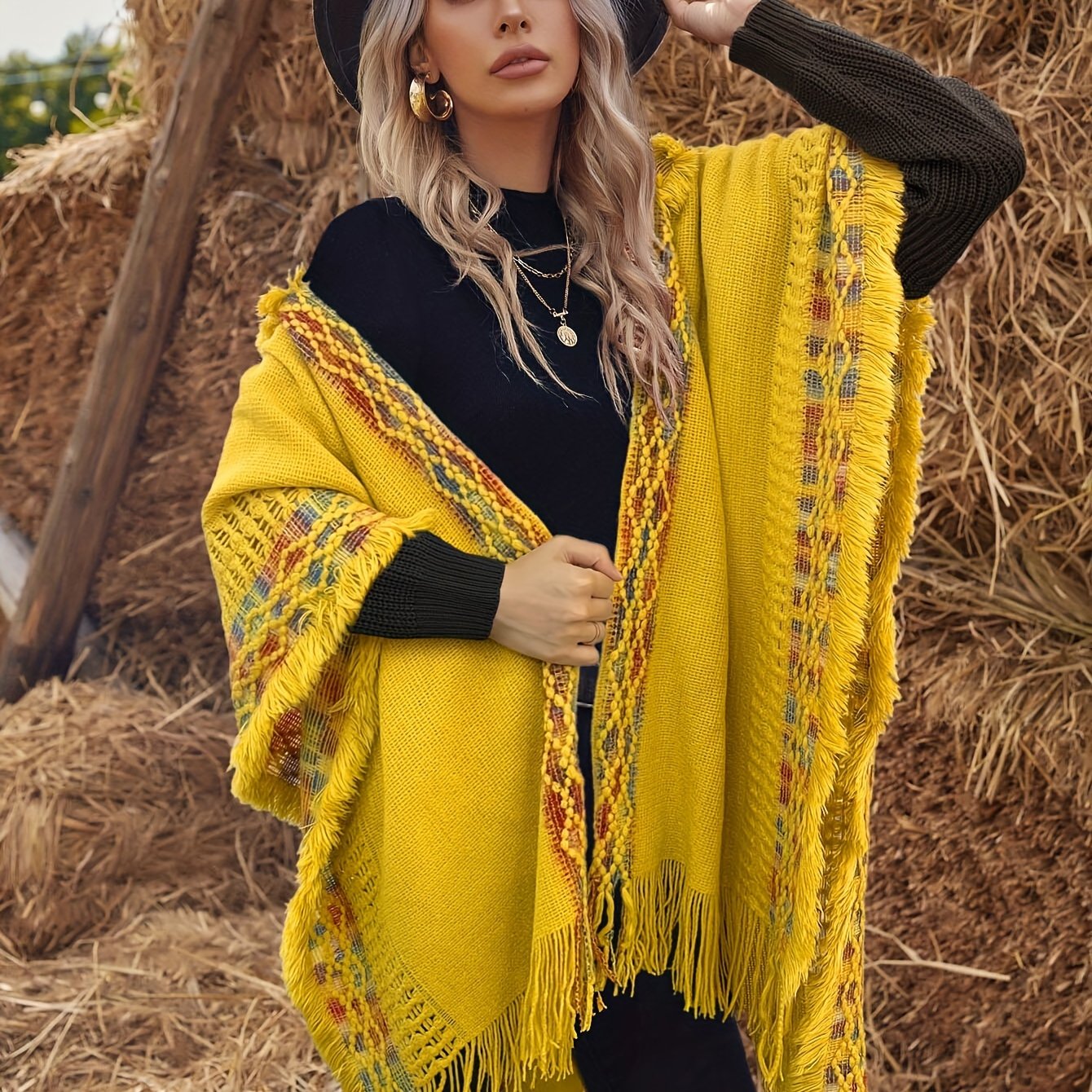 Bohemian-style knitted hooded poncho