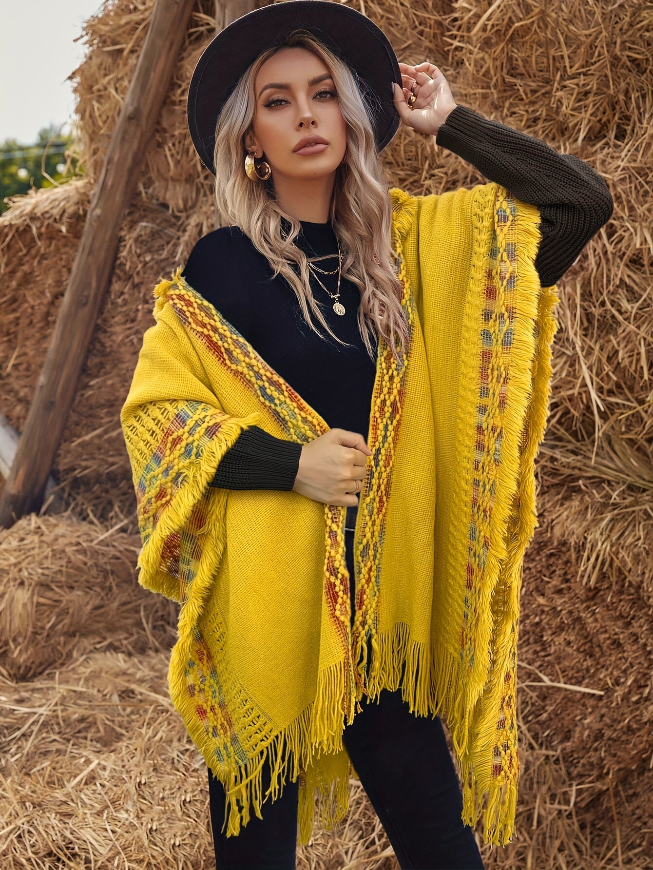 Bohemian-style knitted hooded poncho