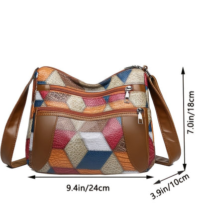 Multicolored patchwork handbag with brown leather accents and measurements on a white background