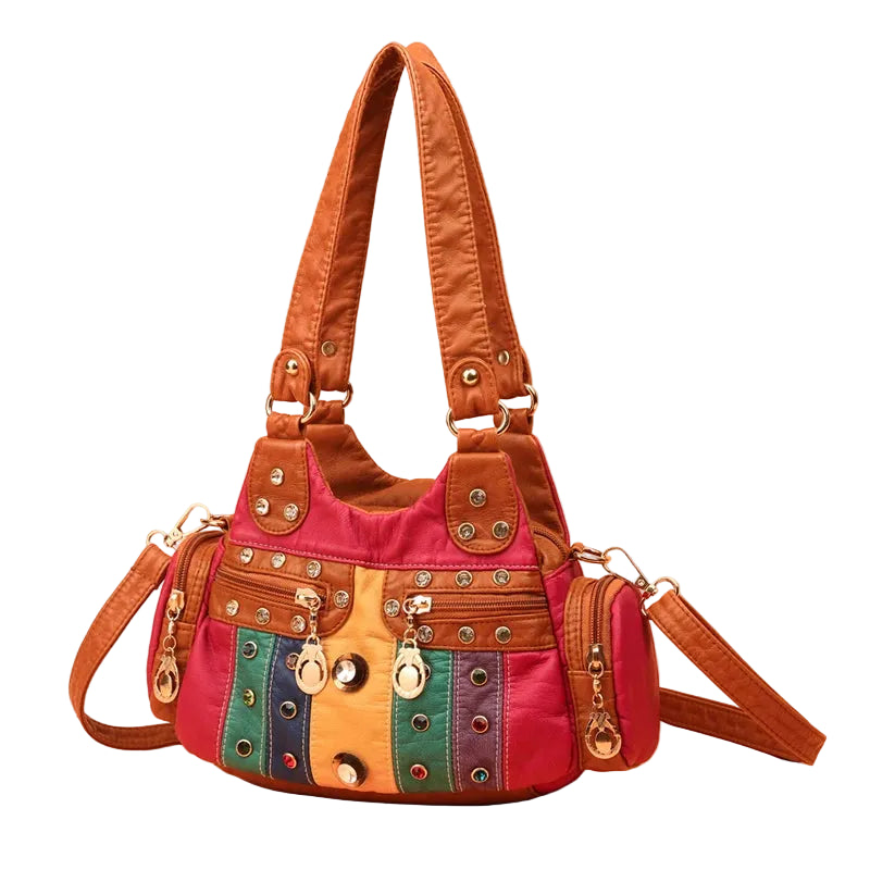 Multicolored handbag with brown straps on a beige background