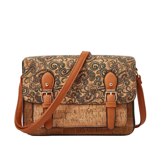 Patterned bag with brown straps on a beige background
