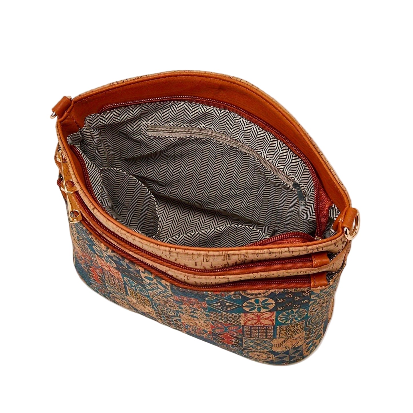 Open handbag with patterned interior on a beige background, featuring Studio Nyssalie logo.