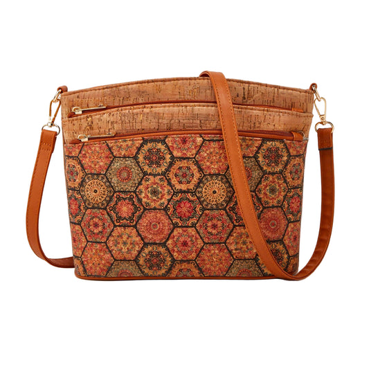 Patterned handbag with brown straps on a beige background, featuring Studio Nyssalie logo.