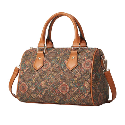 Patterned handbag with brown leather straps on a beige background, featuring Studio Nyssalie logo.
